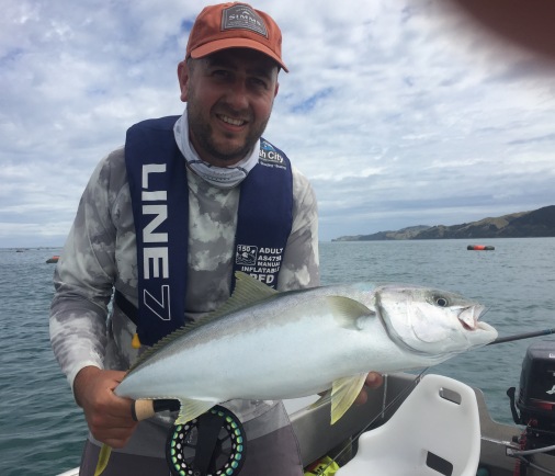 Fat summer kingfish. Salt water fly guide Lucas Allen with a healthy example.